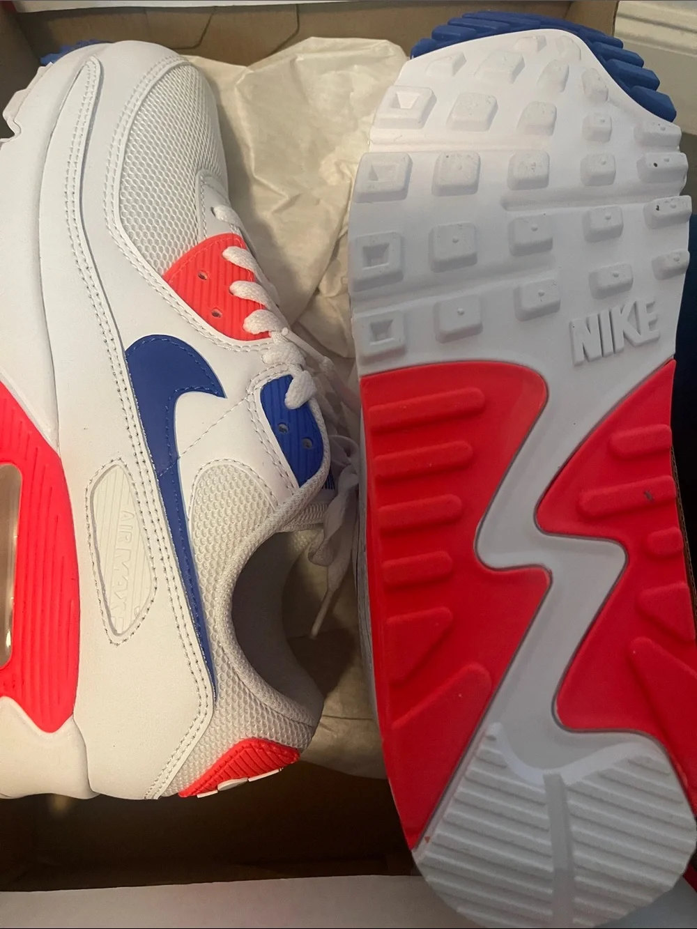 Nike Women's White Sneakers with Blue Swoosh and Neon Coral Accents